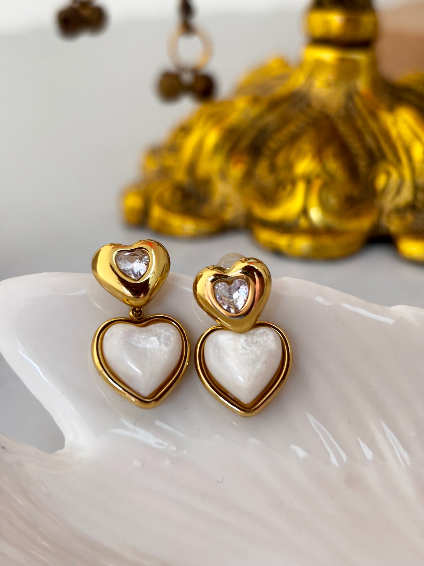 Gold plated heart drop earrings with Mother of Pearl, stainless steel base, lightweight, anti-tarnish and hypoallergenic finish. Best online anti tarnish jewellery. 