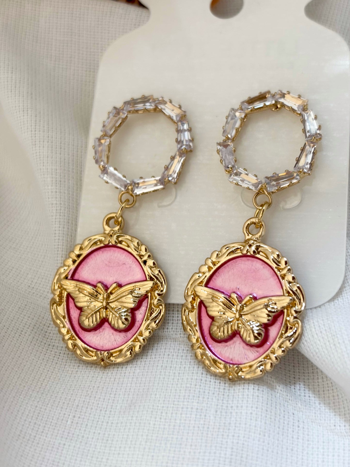 Textured gold-plated dangler earrings with premium finish