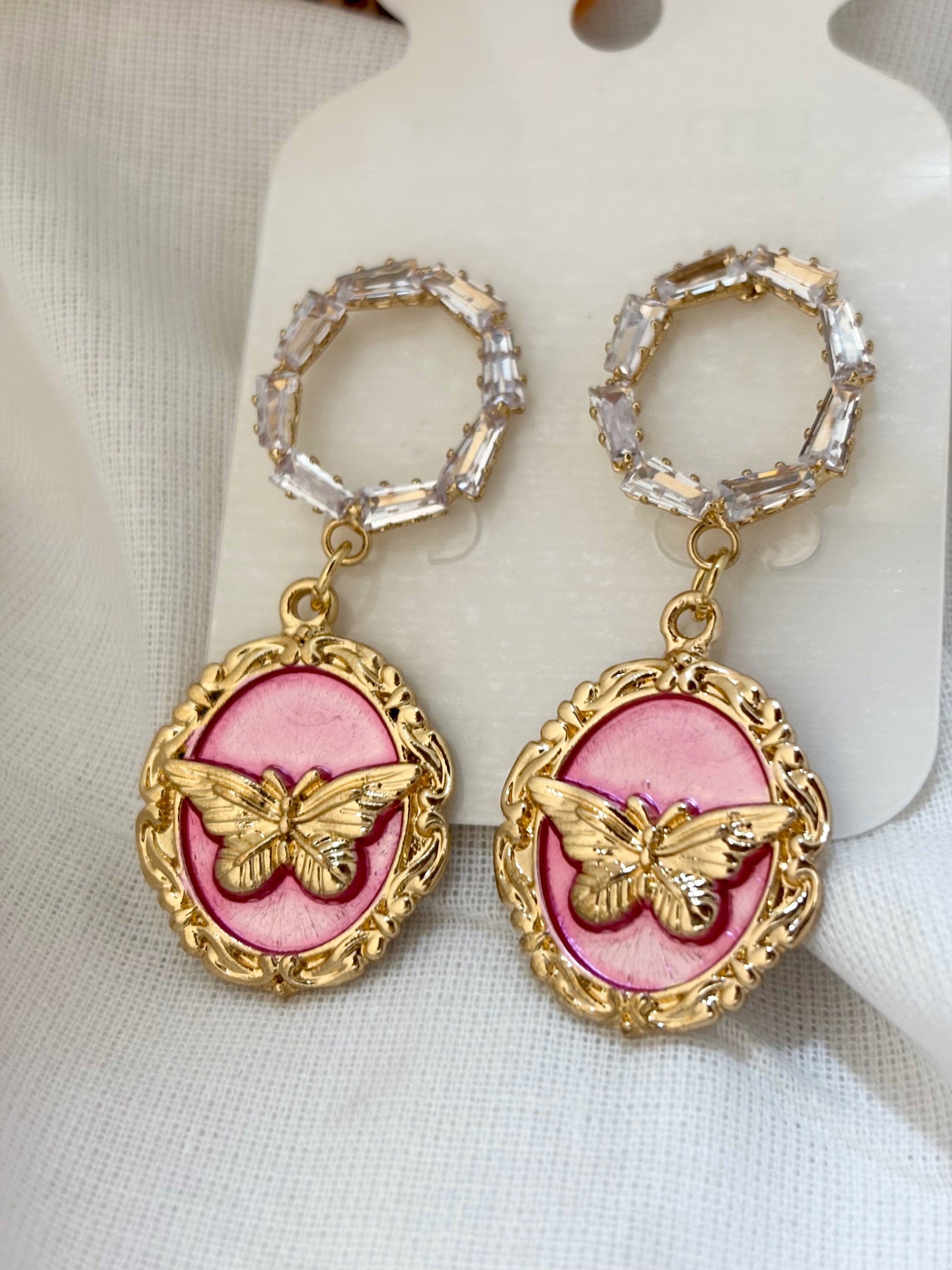 Textured gold-plated dangler earrings with premium finish